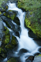 River rushing over rocky hillside - CAIF02134