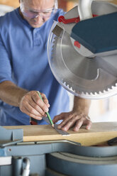Man working in workshop - CAIF02551
