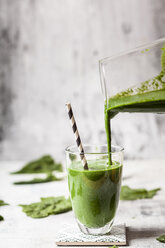 Sugar-free, vegane detox smoothie with spinach, almond milk and banana - SBDF03481