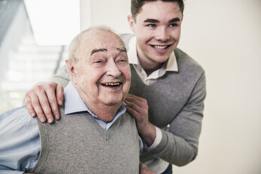 Portrait of happy senior man and young man - UUF12872