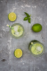 Two glasses of organic lime lemonade with basil - LVF06754