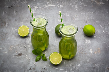 Two glasses of organic lime lemonade with basil - LVF06755