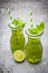 Two glasses of organic lime lemonade with basil - LVF06757