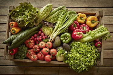 Still life fresh, organic, healthy vegetable harvest variety in wood crate - CAIF04179