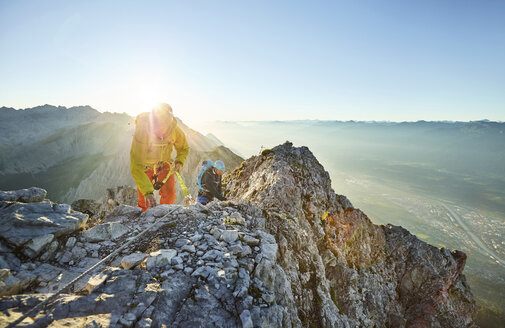 Austria, Tyrol, Innsbruck, mountaineer at Nordkette via ferrata - CVF00235