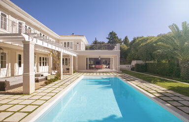 Lap swimming pool along luxury house - HOXF00737