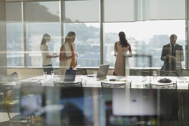 Business people working in conference room - HOXF01209