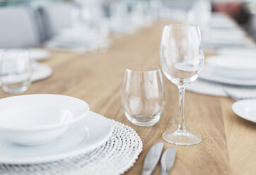 Still life simple placesetting on wood dining table - HOXF02296