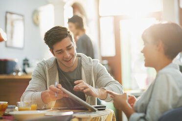 Young couple college students studying using digital tablet - HOXF02541