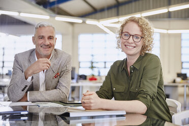 Portrait smiling business people in meeting - HOXF02986