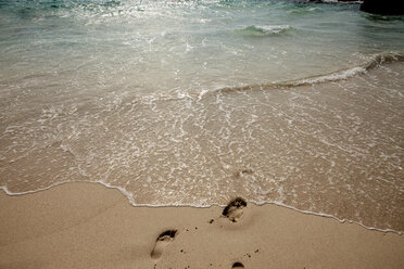 High angle view of footprints at sea shore - CAVF00294