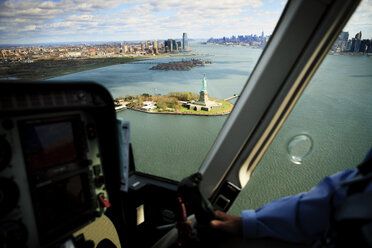 Statue of Liberty amidst bay seen through helicopter window - CAVF00297