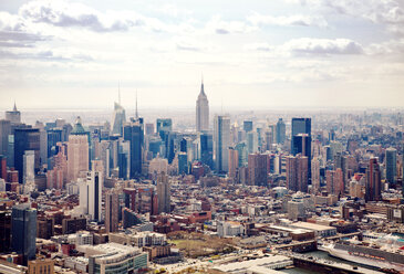 High angle view of modern buildings in New York City against sky - CAVF00301