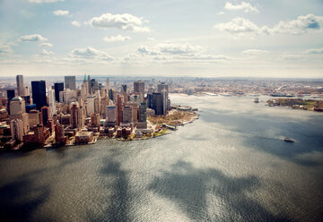 High angle view of cityscape by sea against sky - CAVF00470