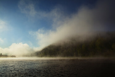 Idyllic view of lake during foggy weather - CAVF00571