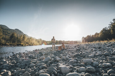 Canada, British Columbia, Chilliwack, two men resting at Fraser River - GUSF00405