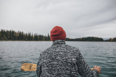 Canada, British Columbia, man in canoe on Boya Lake - GUSF00507