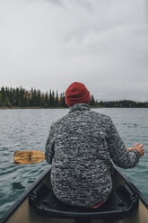 Canada, British Columbia, man in canoe on Boya Lake - GUSF00508