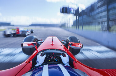 Personal perspective formula one race car driver speeding on race track - CAIF06463