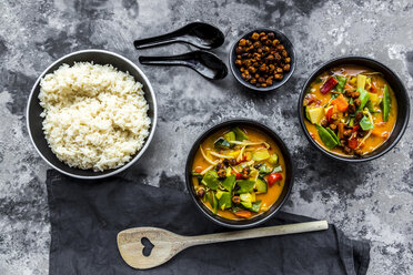 Red curry in bowls, rice and roasted chickpeas - SARF03598