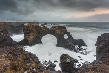 Rock formations among stormy ocean, Amarstapi, Snaefellsnes, Iceland - CAIF07548