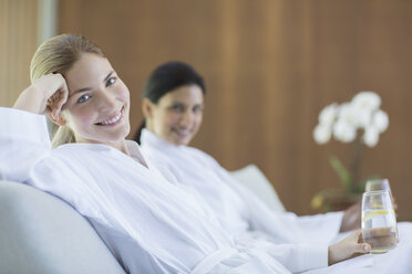 Women relaxing together in spa - CAIF07827