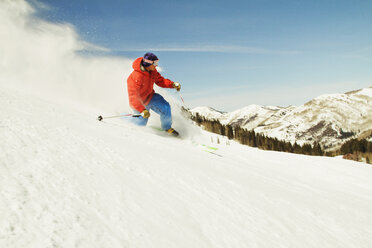 Man skiing on ski slope against clear sky - CAVF01409