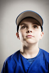 Baseball player looking away against white background - CAVF04043