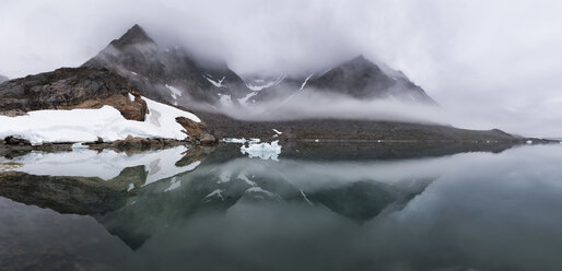 Greenland, Sermersooq, Kulusuk, Schweizerland Alps, mountains reflecting in water - ALRF00924