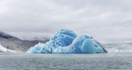 Greenland, Sermersooq, Kulusuk, Schweizerland Alps, iceberg in water - ALRF00989