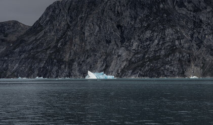 Greenland, Sermersooq, Kulusuk, Schweizerland Alps, iceberg in water - ALRF00990