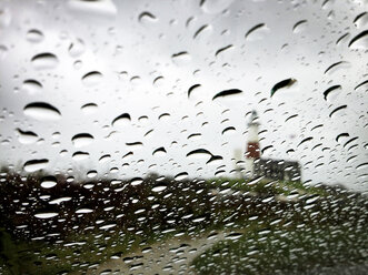 Lighthouse seen through wet windshield - CAVF04211