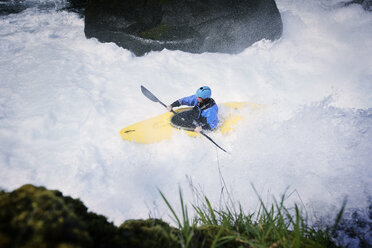High angle view of male kayaker in river - CAVF04348