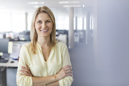 Portrait confident businesswoman in office - CAIF09716