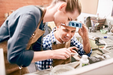 Jewelers working in workshop - CAIF09906