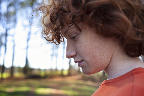 Close-up of boy in backyard stock photo