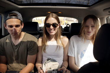 Friends sitting in car - CAVF05142