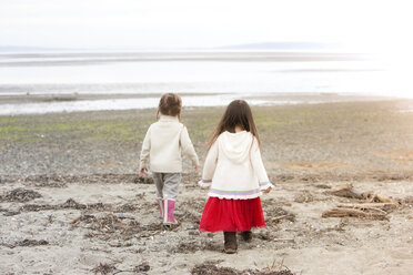 Girls walking on beach - CAIF11066
