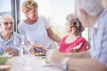 Senior couples enjoying lunch - CAIF11417