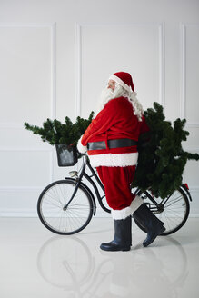 Weihnachtsmann mit Fahrrad - ABIF00103