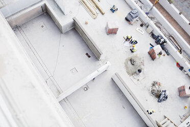 Overhead view of construction workers at construction site - CAIF11617