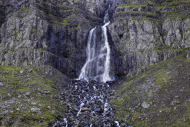 Waterfall among cliffs, Djupavik, West Fjords, Iceland - CAIF12248