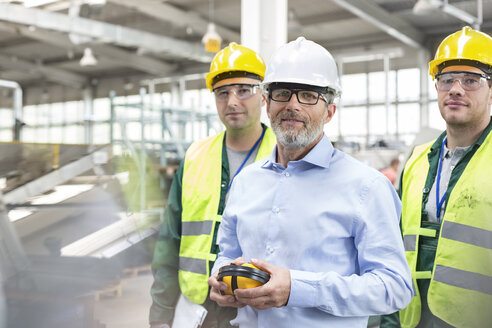 Portrait confident engineer and workers in protective workwear - CAIF13168