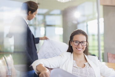 Portrait confident businesswoman in office - CAIF13395