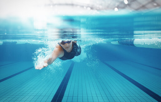 Swimmer racing in pool - CAIF14176