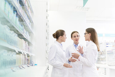 Pharmacists consulting in pharmacy - CAIF14668