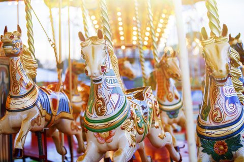 Carousel horses in amusement park stock photo