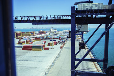 Crane and cargo containers at waterfront - CAIF15107