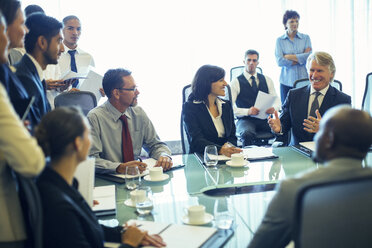 Large group of business people having meeting in conference room - CAIF15445