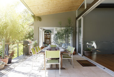 Dinning table and chairs in sunny patio - CAIF15508